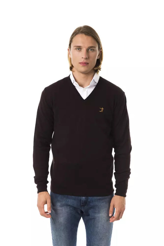 Man wearing dark sweater with white collar