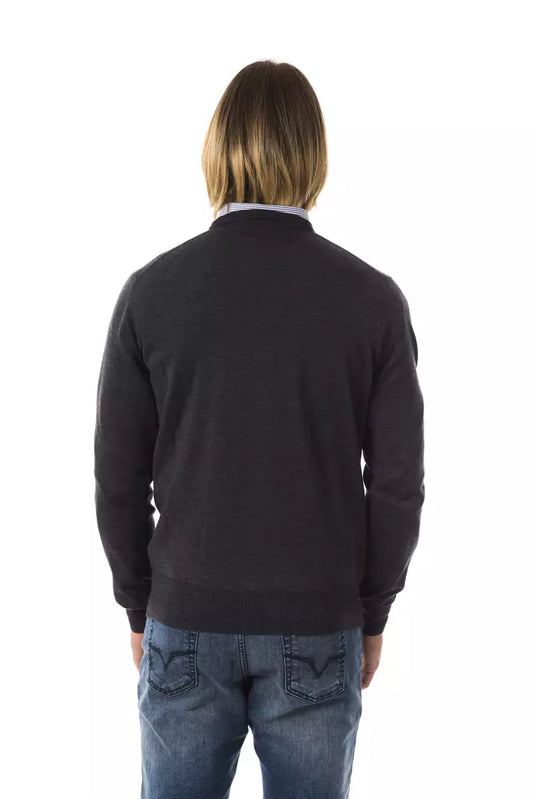 Man wearing dark sweater with horizontal stripes