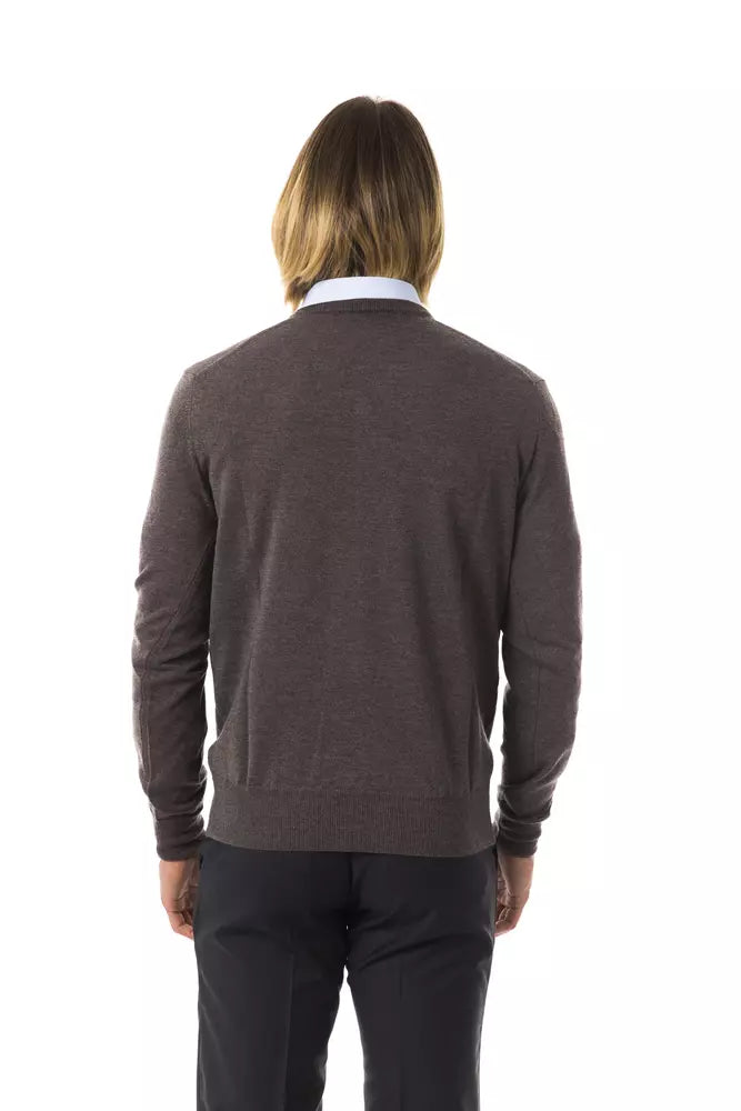 Man wearing dark sweater and pants