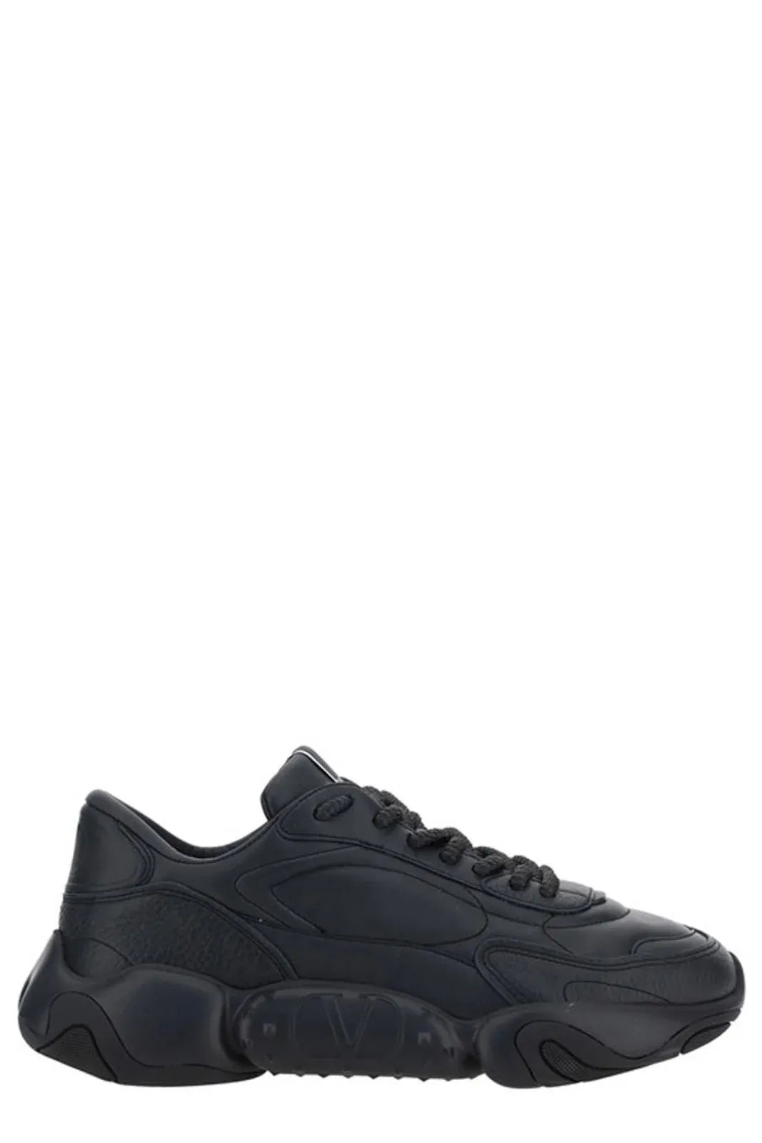 Black sneaker with white sole and laces
