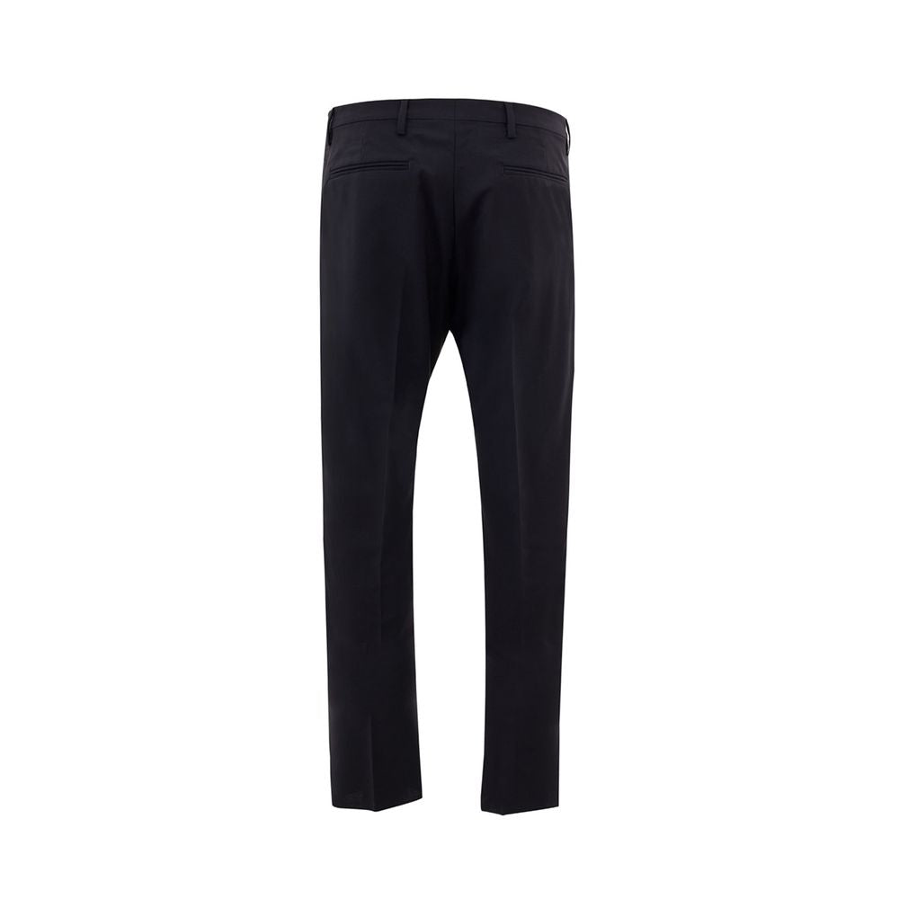 A pair of black wool dress pants by Valentino