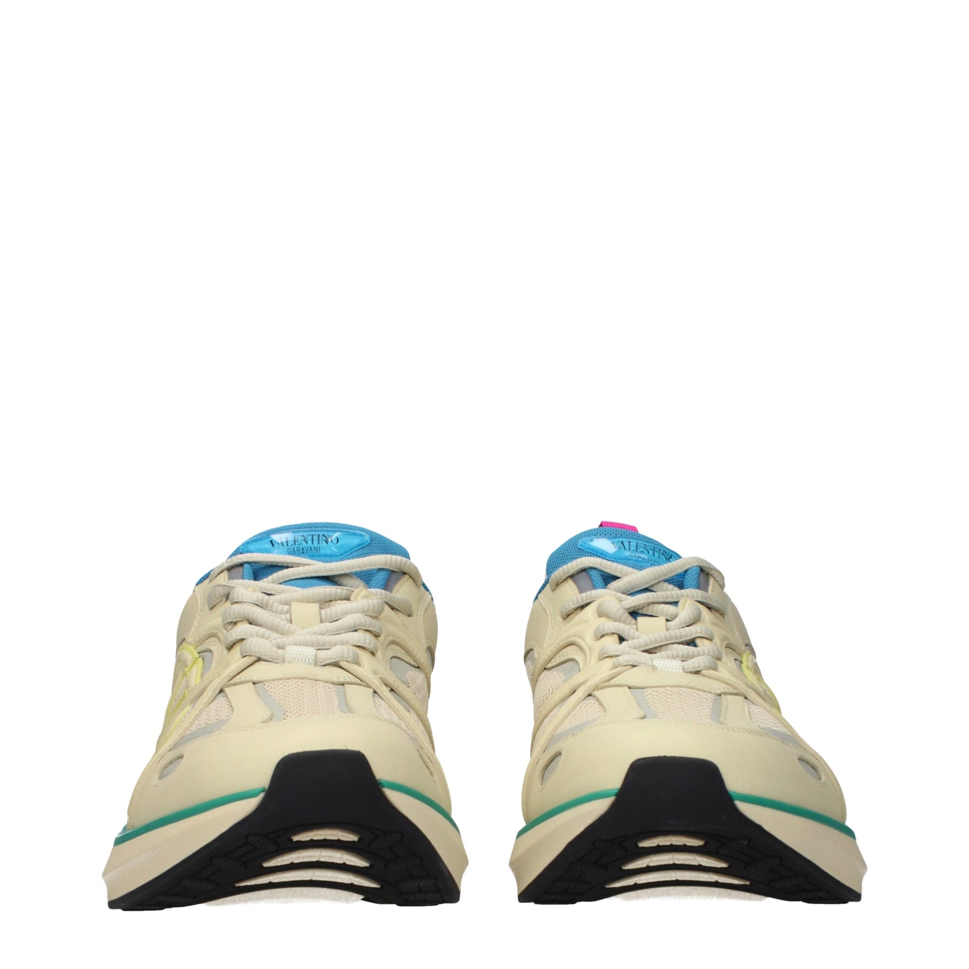 Pair of beige athletic sneakers with laces, fabric upper and rubber sole