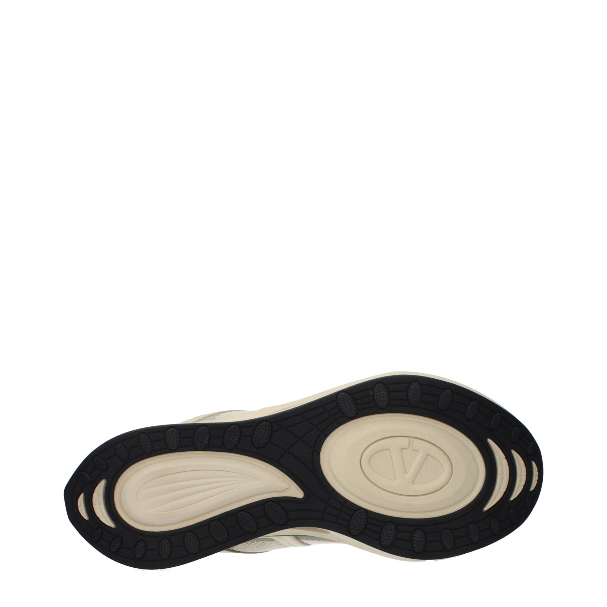 A single beige athletic shoe with a black sole, featuring the Valentino Garavani logo on the side