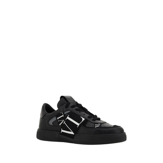 Black sneaker with white laces and logo on side