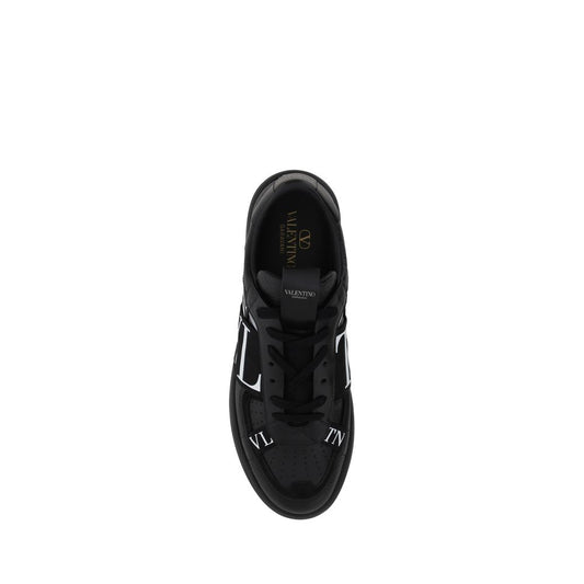 Black sneaker with white laces and logo on side