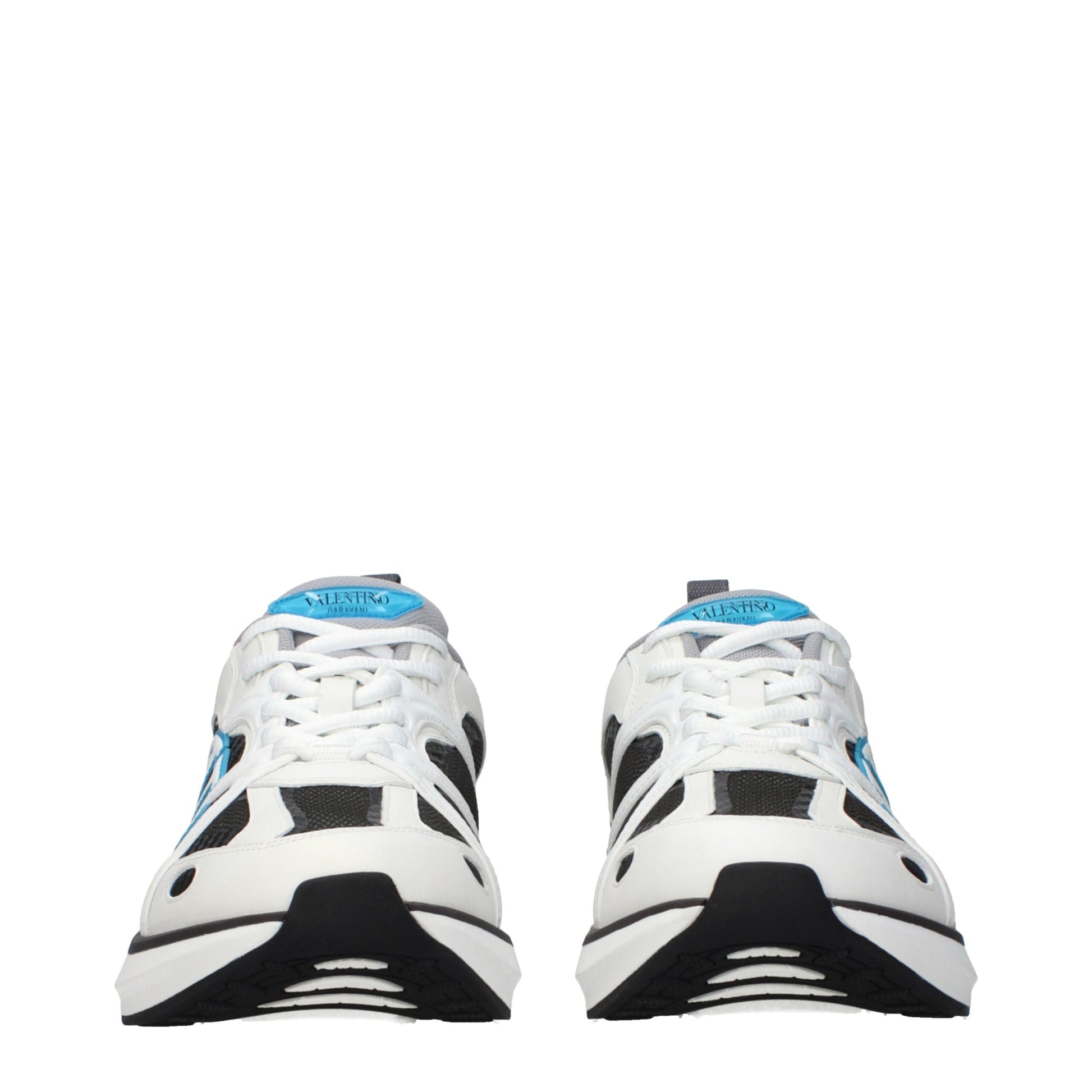 Pair of white athletic sneakers with blue accents, featuring a lace-up closure and a low top design