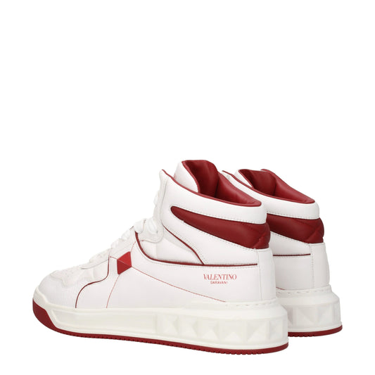 Red and white high top sneakers with logo on side