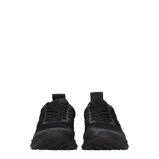 Pair of black athletic sneakers with laces, featuring a knit upper and a rubber sole
