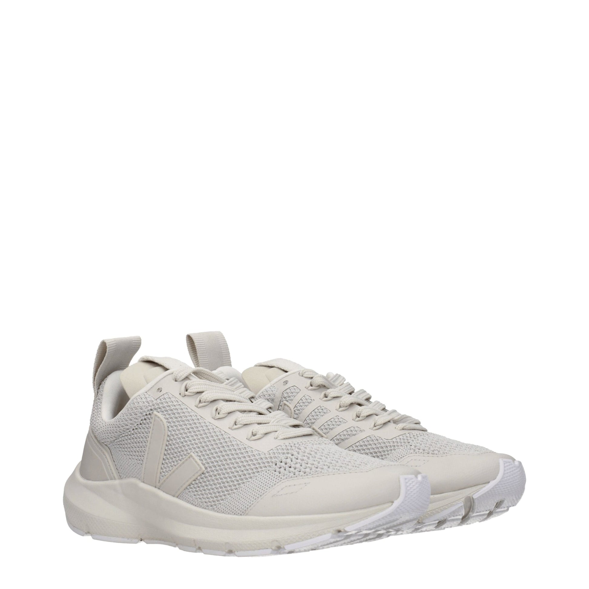 Tan athletic sneakers with white sole