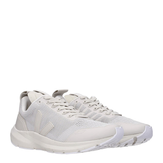Light beige athletic sneakers with white laces