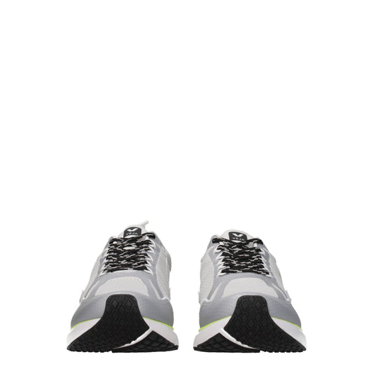 Pair of gray athletic sneakers with black laces