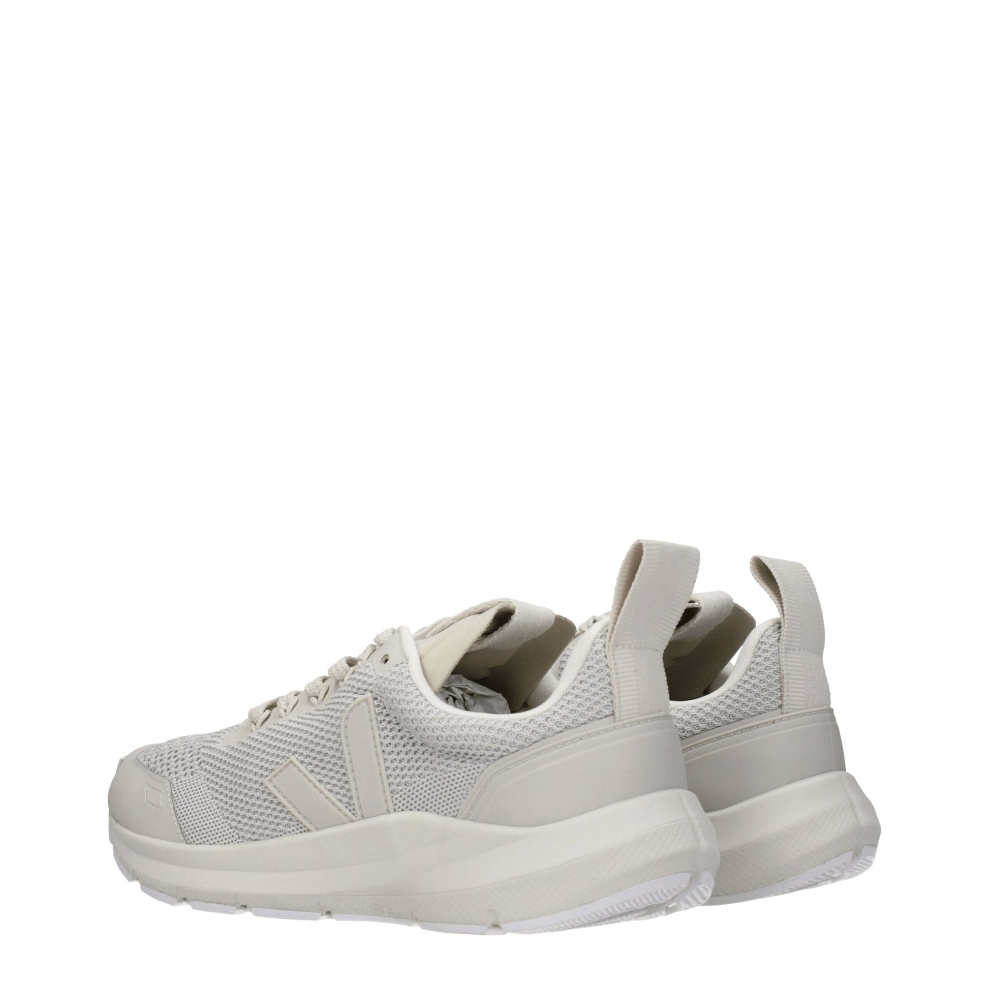 Pair of gray fabric athletic sneakers with white soles