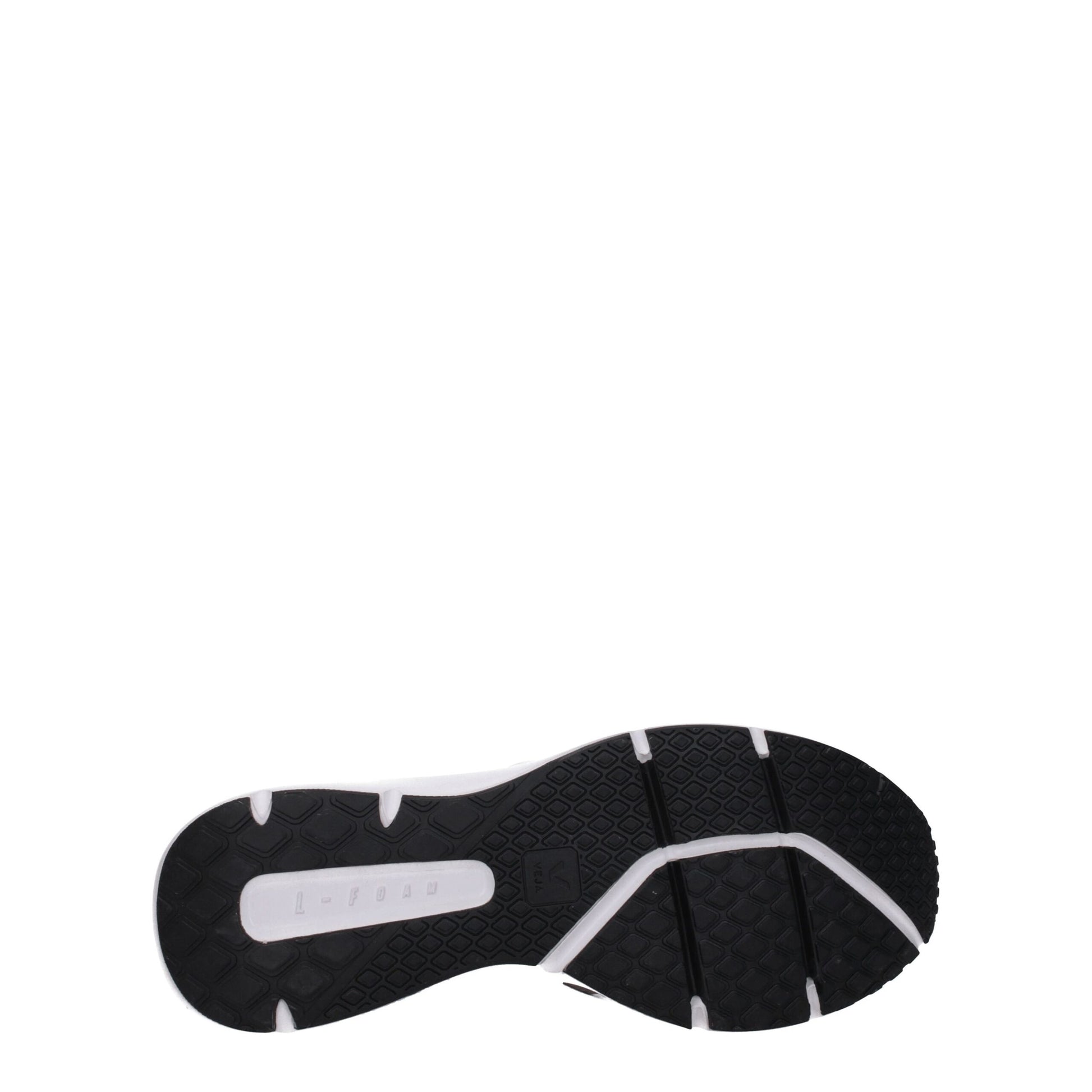 Black and white athletic sneaker with rubber sole, laces, and logo on side