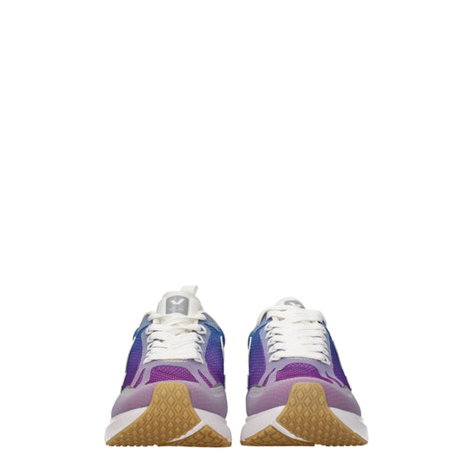 Pair of multicolored athletic sneakers with white laces, featuring a patterned design on the upper and yellow rubber soles