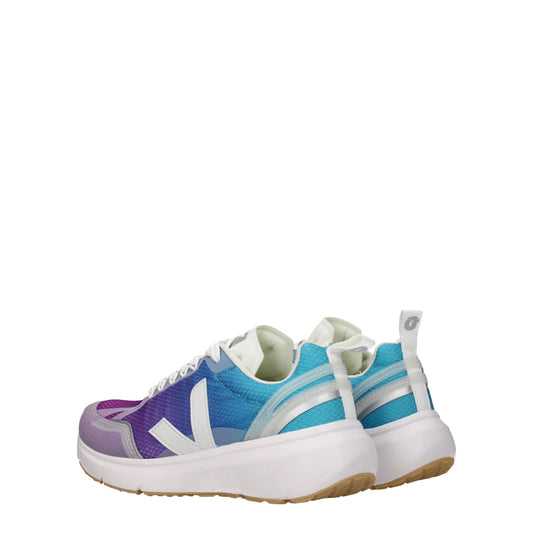 Pair of colorful sneakers with white soles, featuring a mix of blue, purple, and green hues