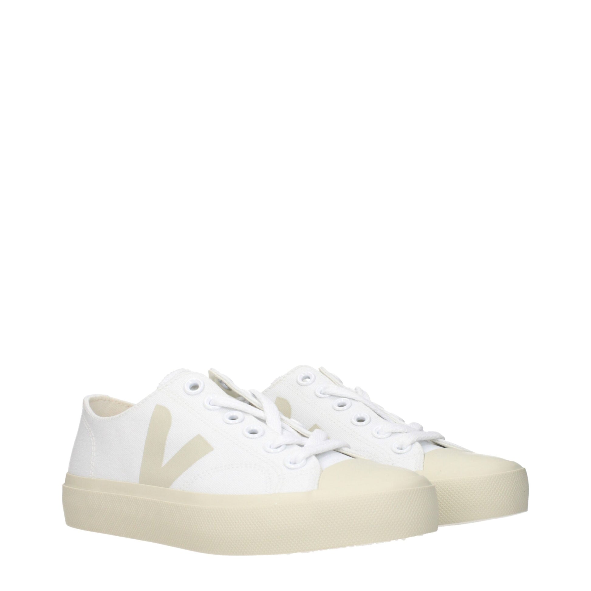 A pair of white sneakers with a low top featuring a fabric upper and a chunky sole