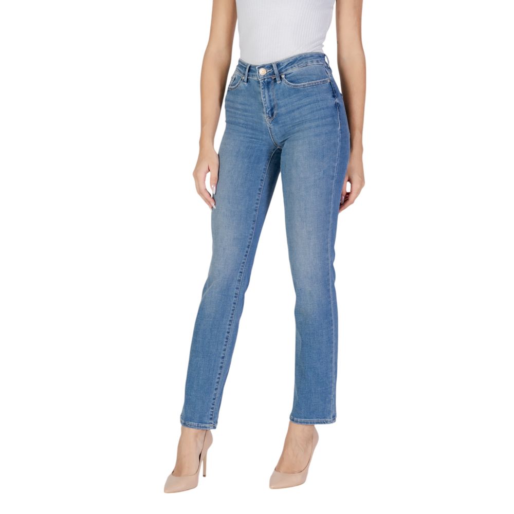 Woman wearing blue jeans and high heels
