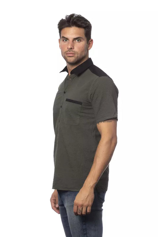 Man wearing dark polo shirt