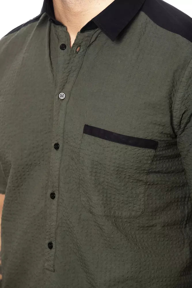 The shirt is olive green with black buttons