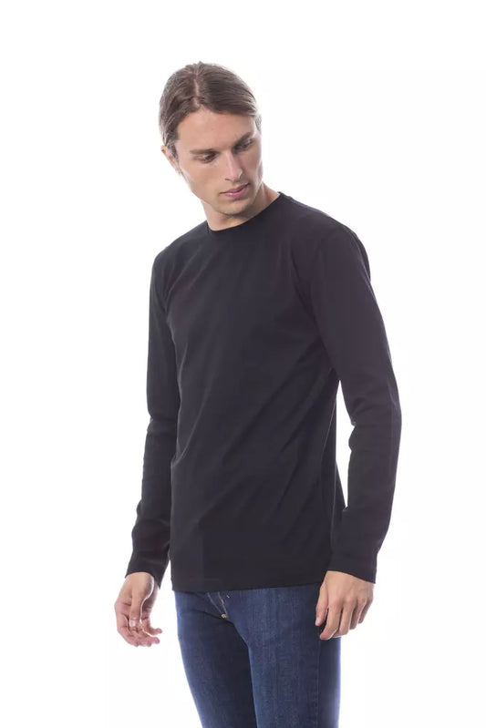 Man wearing black long sleeve shirt