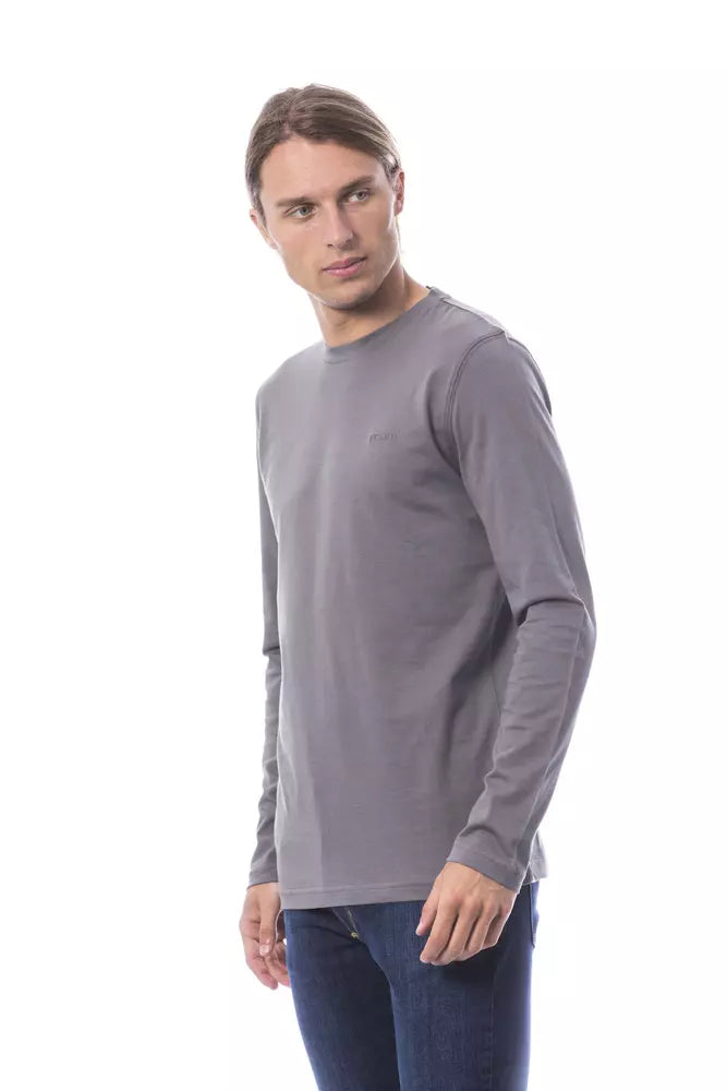Man wearing long sleeve shirt