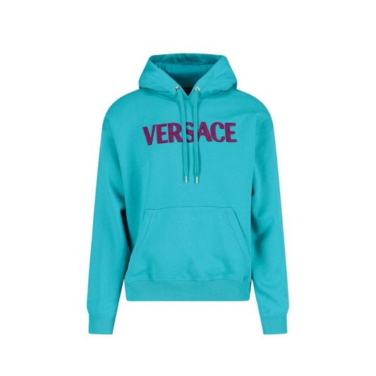 Blue hoodie with pink letters spelling "Versace"