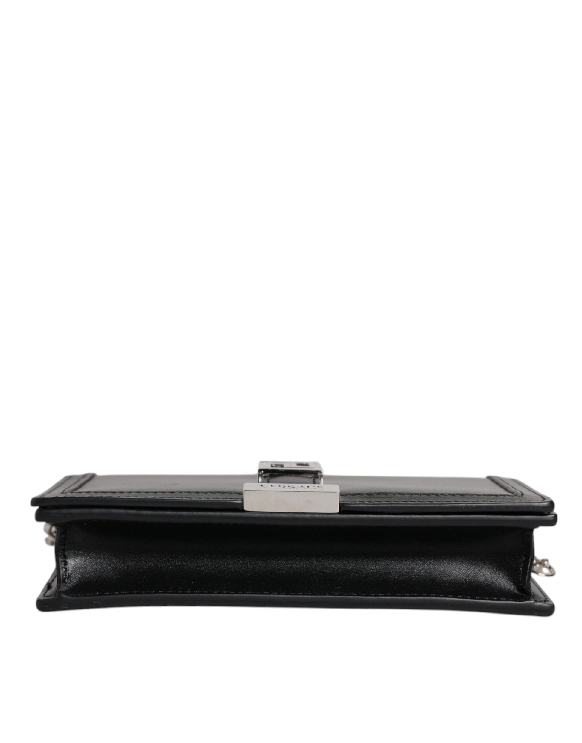 Black leather clutch purse with silver hardware