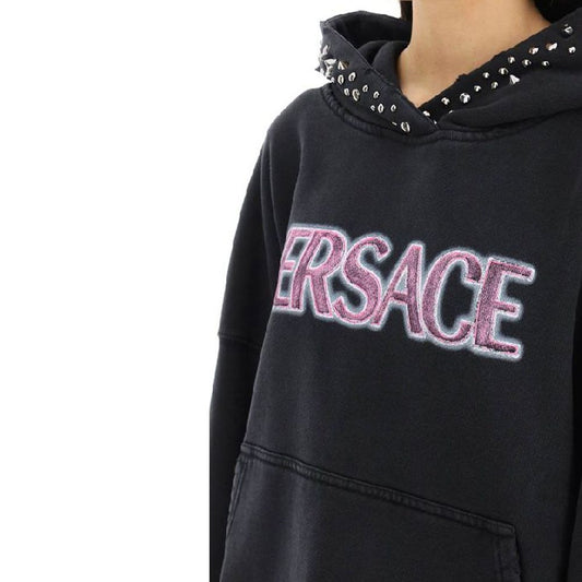 Black hoodie with pink logo