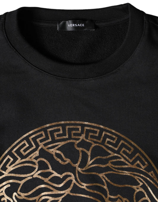Black sweater with gold zigzag pattern on front