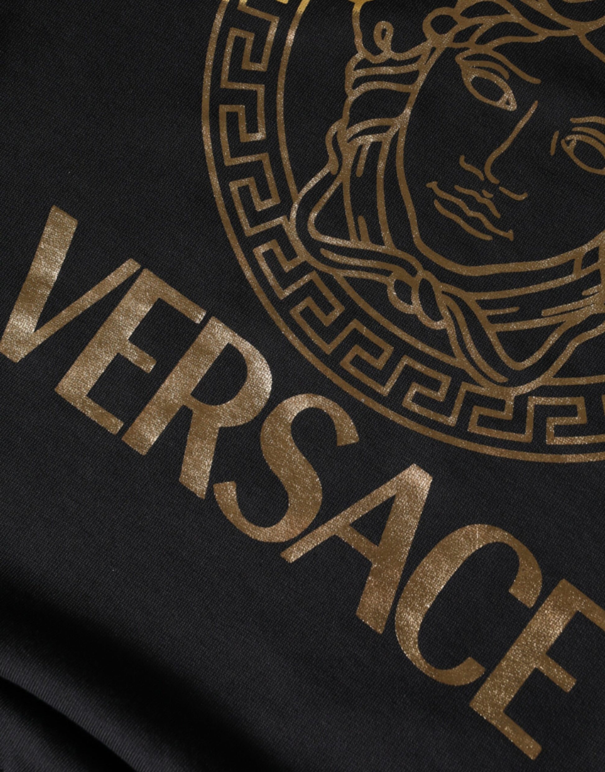 Black t-shirt with gold logo