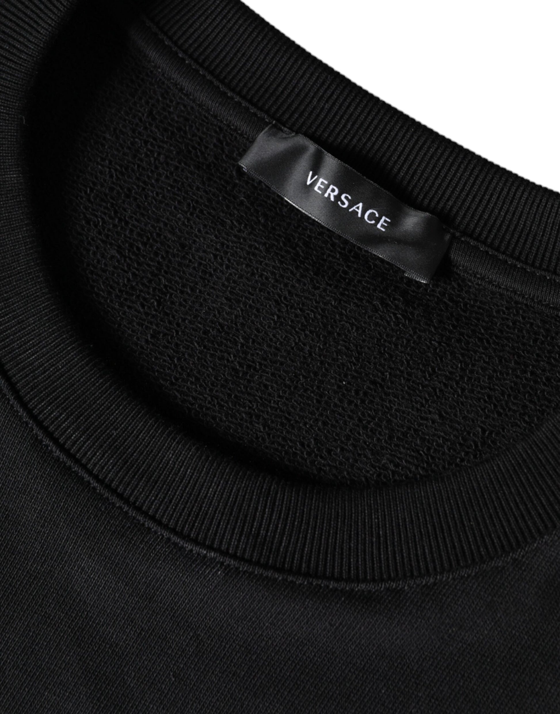 Black sweater on hanger