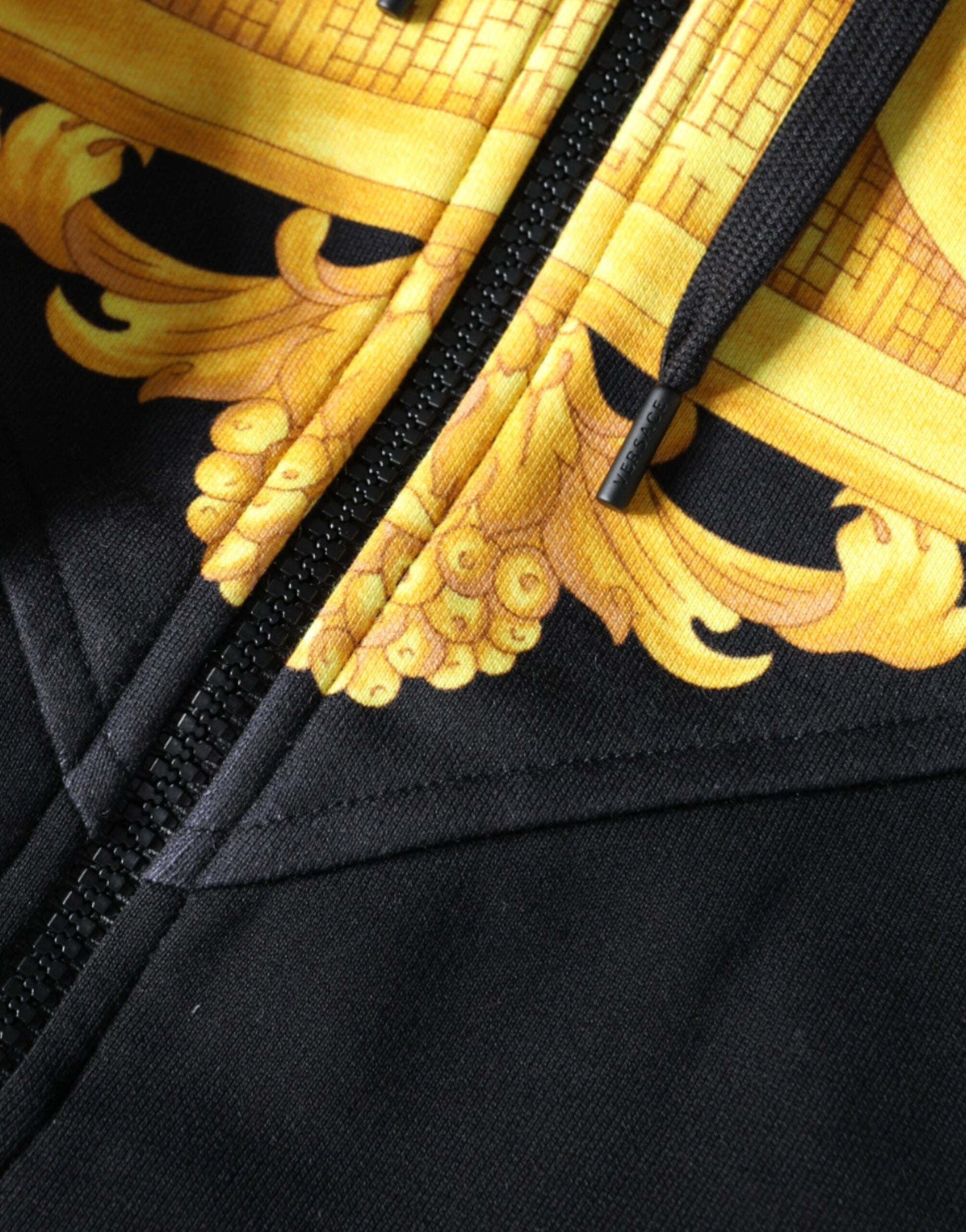 Black jacket with gold embroidery on front