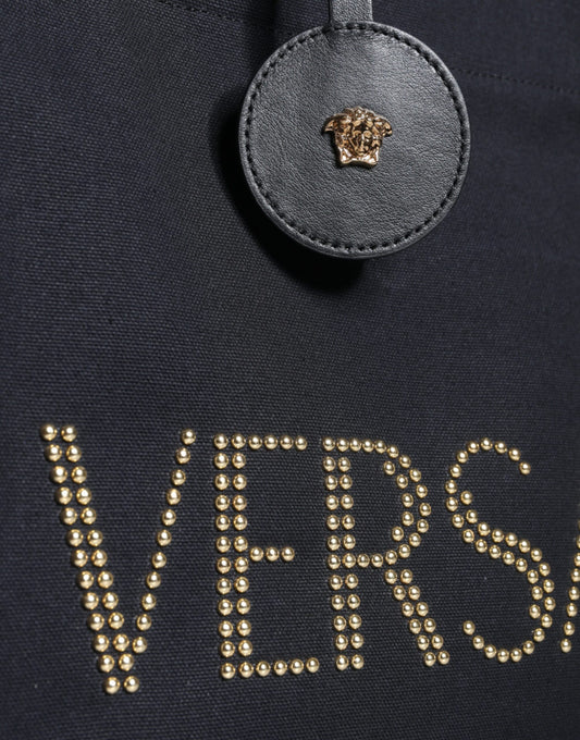 Black jacket with gold lettering and logo