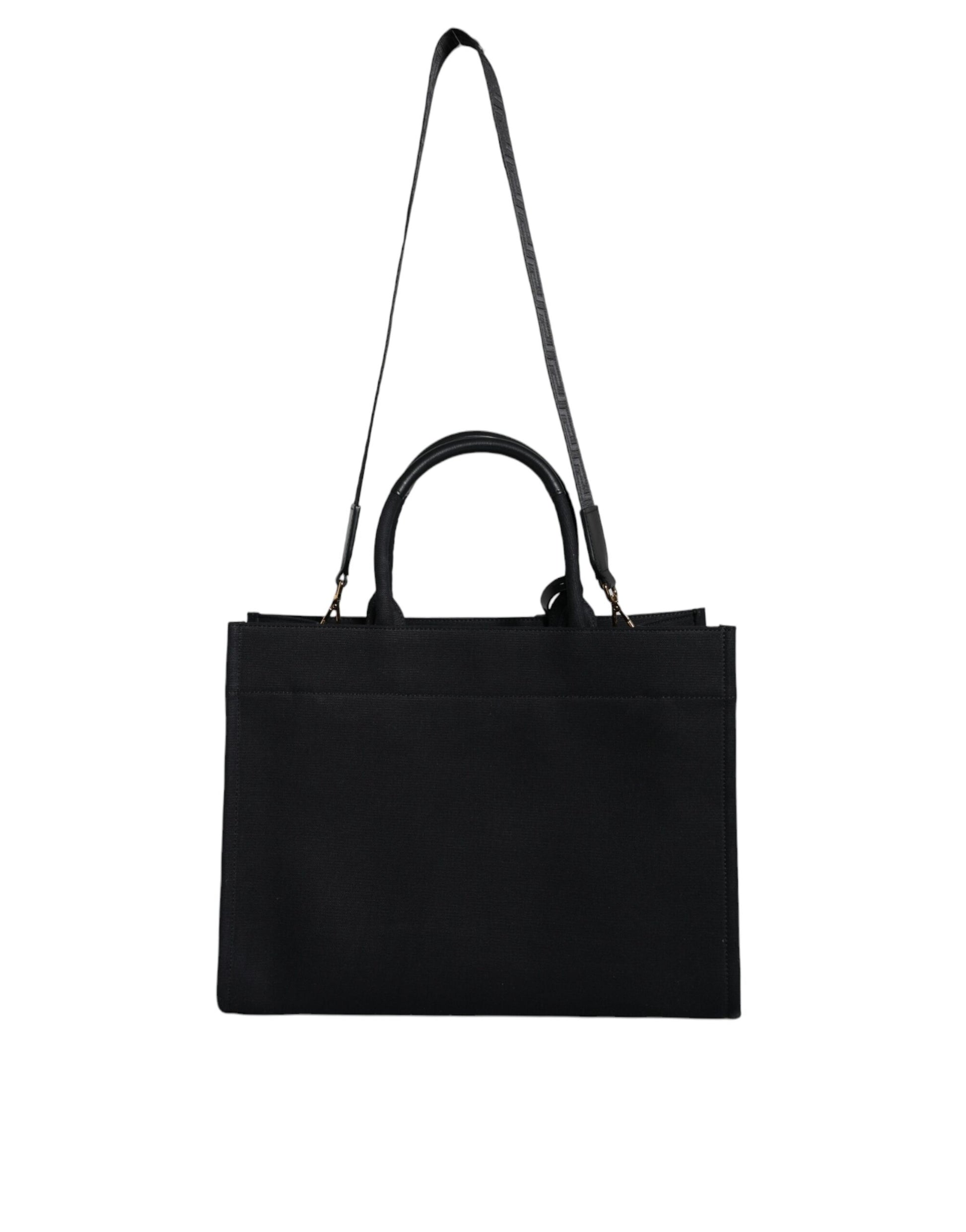 Black leather handbag with gold accents