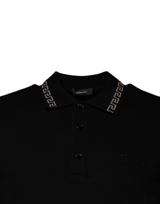 Black polo shirt with gold zipper and logo