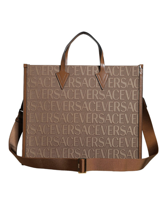 Brown leather tote bag with handles and logo print
