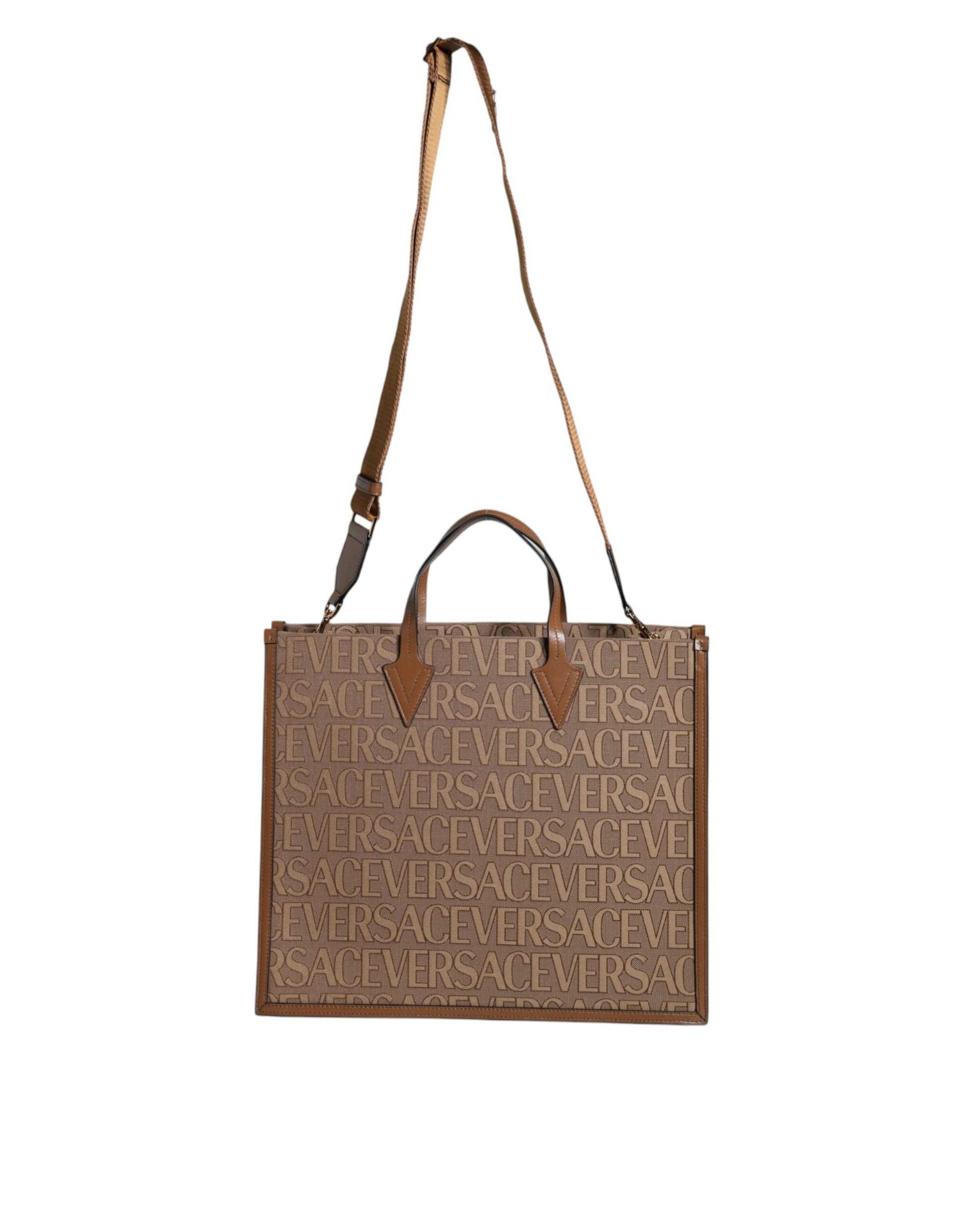 Brown leather crossbody bag with embossed writing on front
