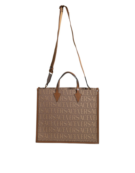 Brown leather crossbody bag with embossed writing on front
