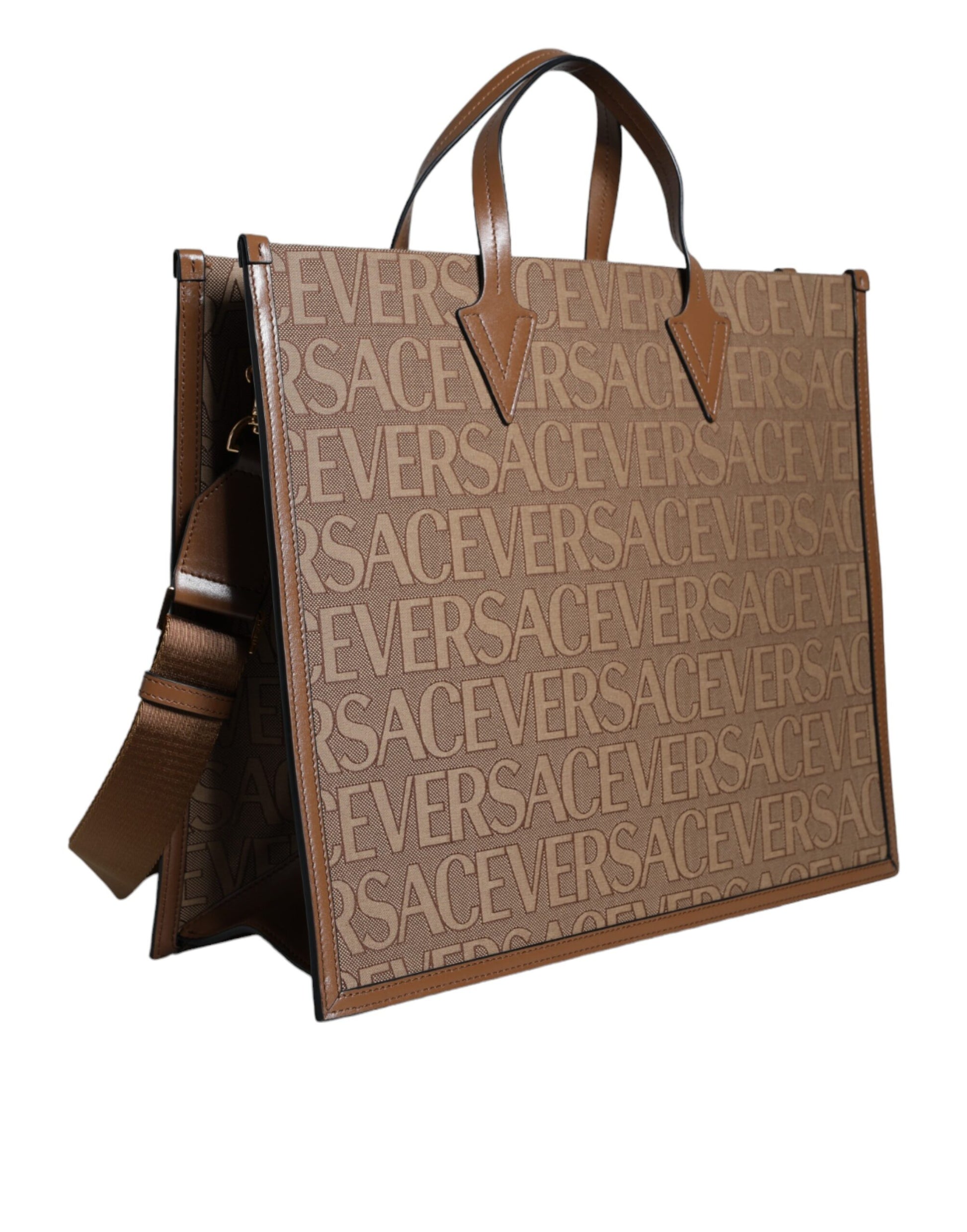 Brown leather handbag with handles and logo