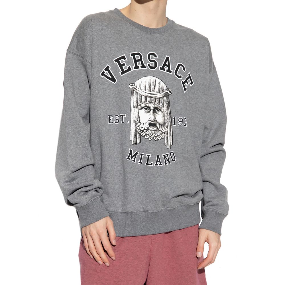 Grey sweatshirt with white lettering and graphic