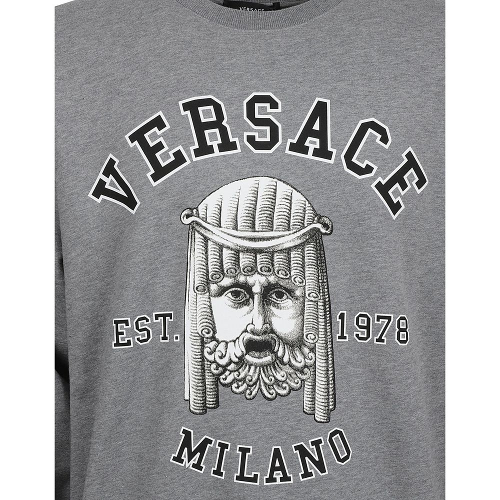 Grey sweatshirt with white lettering and graphic design