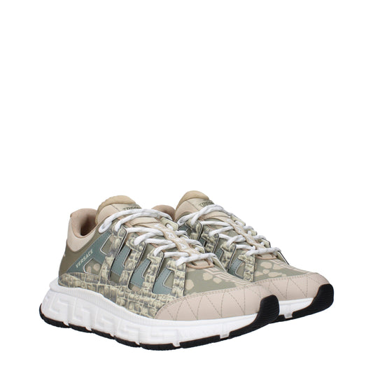 Pair of green camouflage sneakers with white laces, featuring a patterned design on the side and a low top