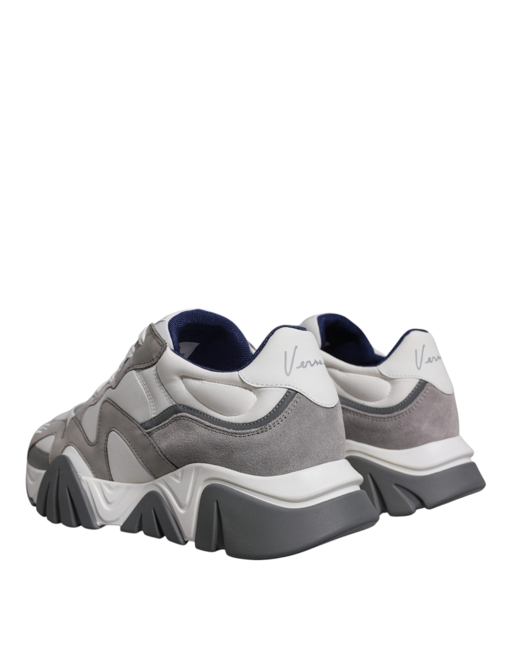 Pair of grey leather sneakers with chunky sole and neoprene upper