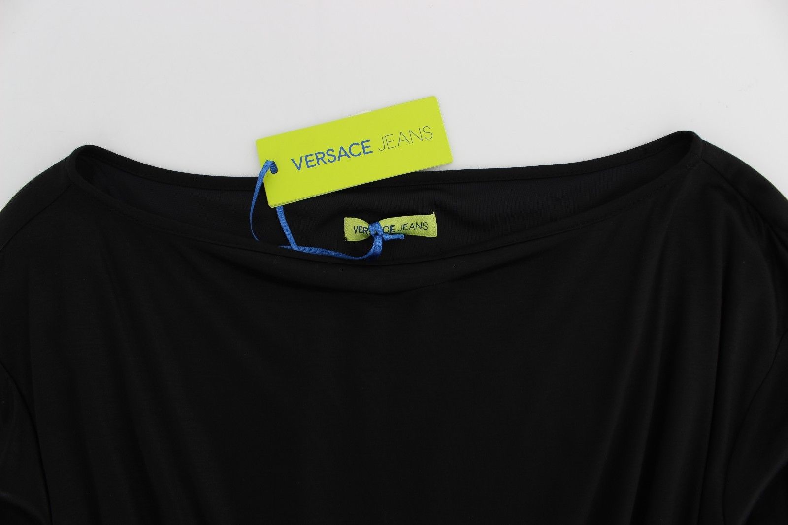 Black long sleeve shirt on hanger