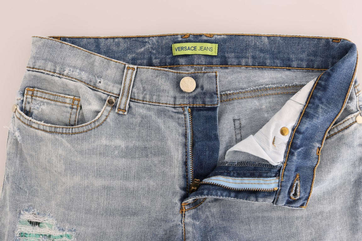 Blue denim jeans with a white tag on the waistband