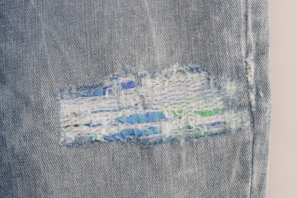 Blue denim jeans with a white logo on the back pocket