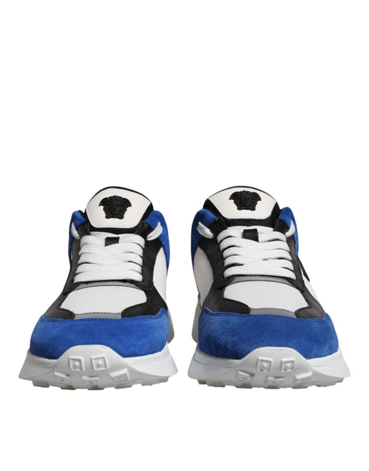 Pair of blue and white sneakers with laces
