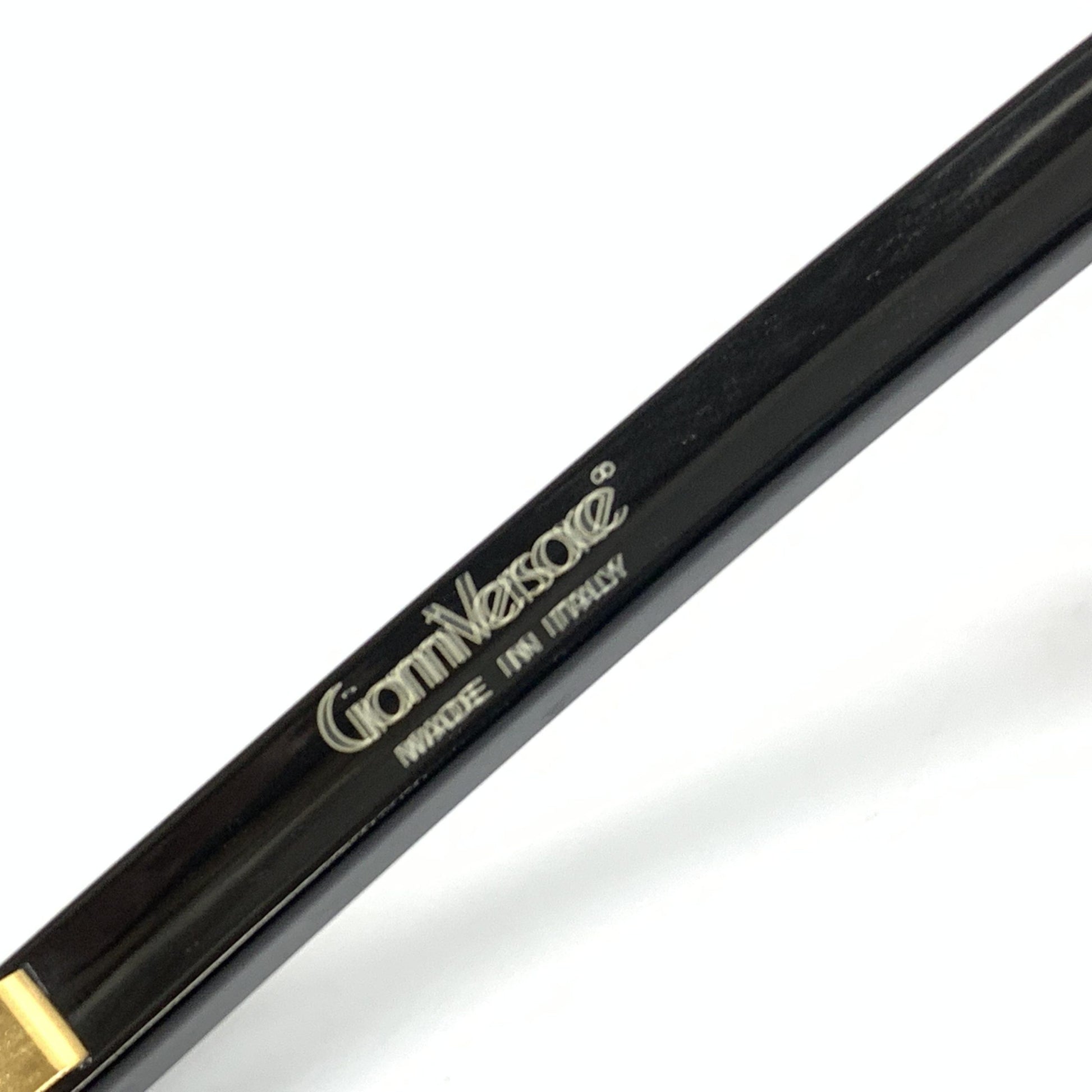 Black pen with gold tip