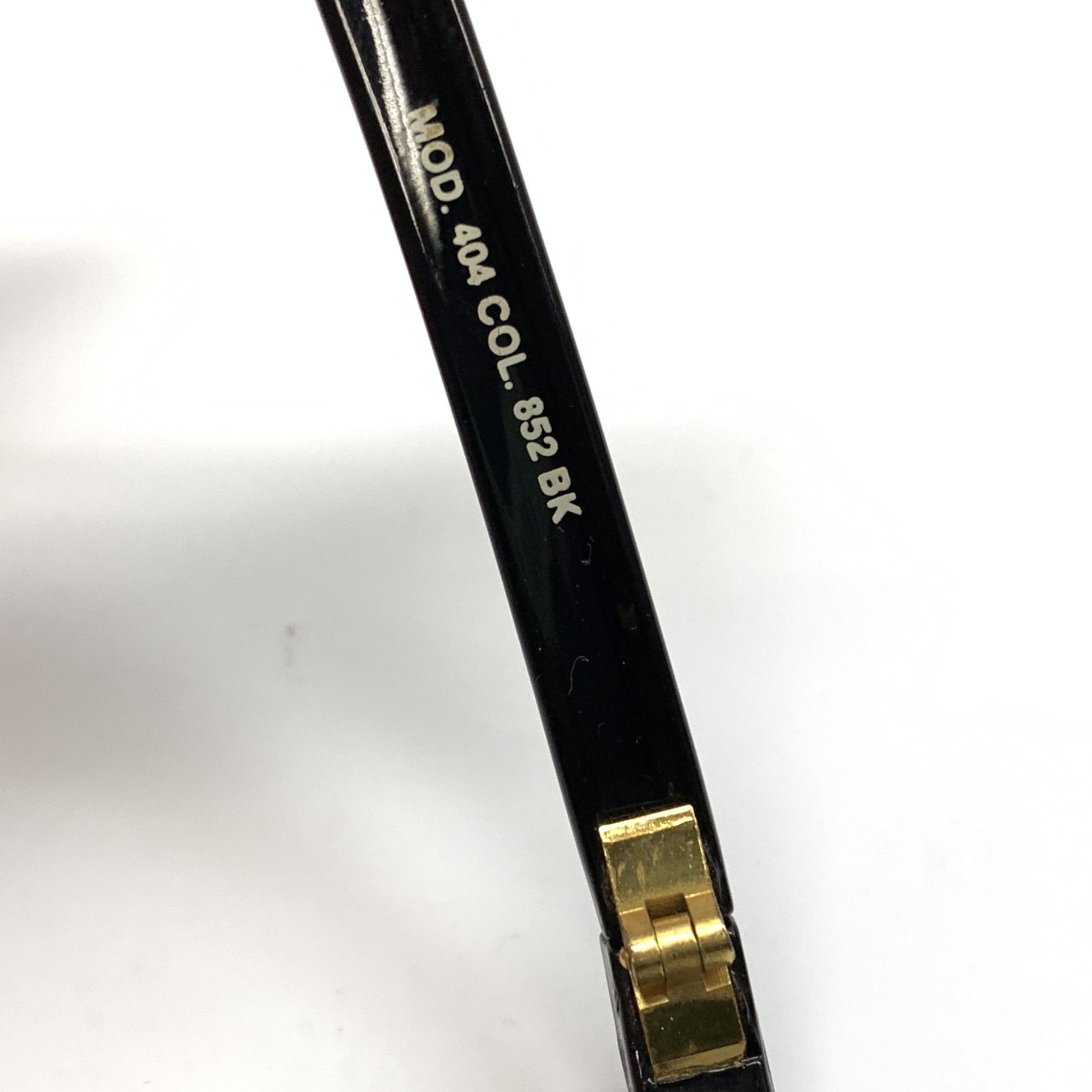 Black mechanical pencil with gold tip