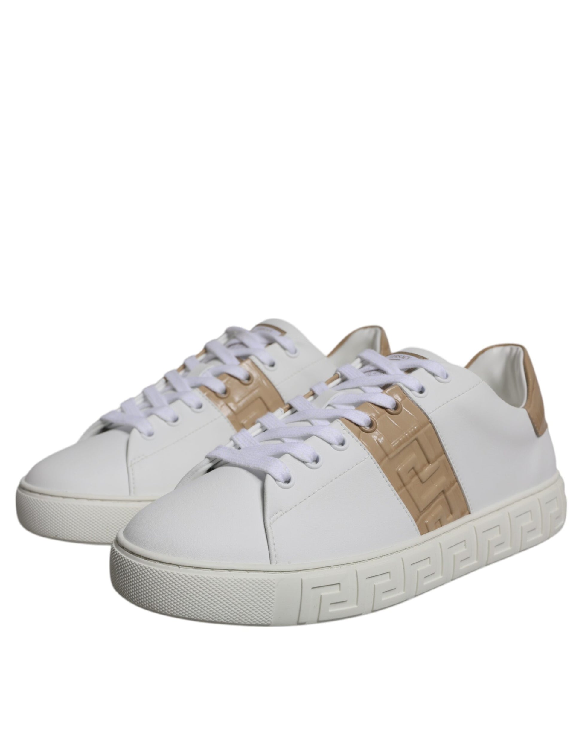 White sneakers with brown stripe and laces